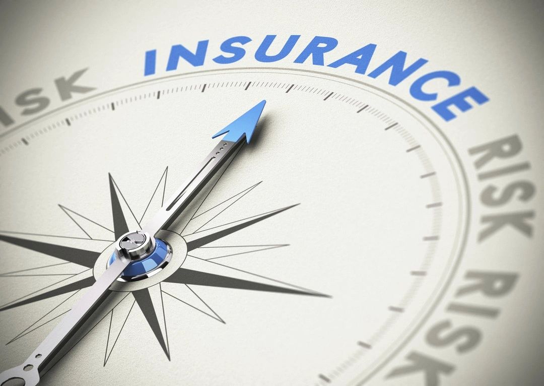 Compass pointing toward insurance and risk management